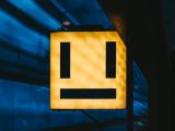 What does the upside-down emoji mean?